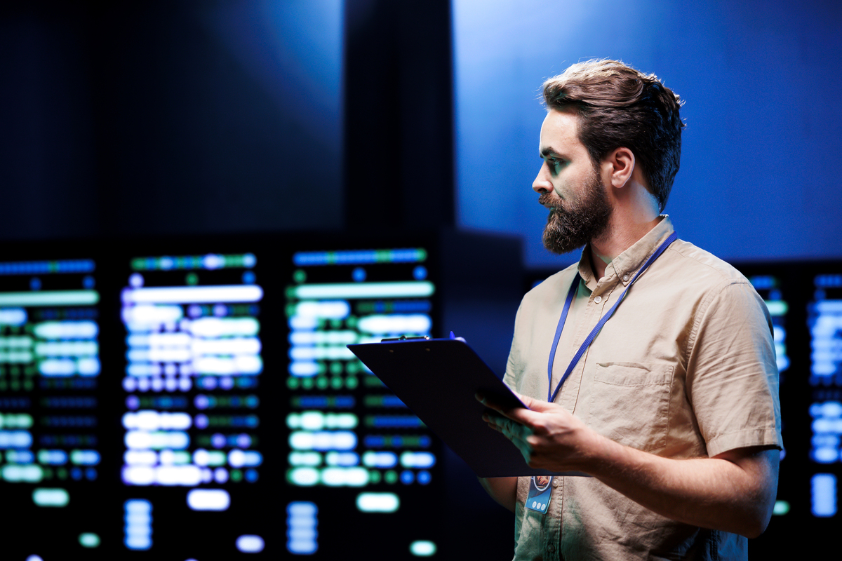 cybersecurity-man-standing-in-server-room